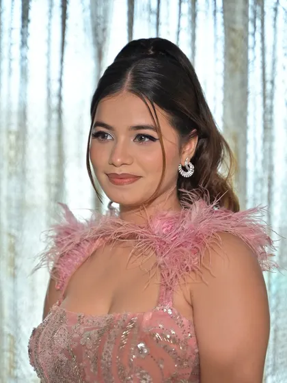 Another angle of this party-ready glam. The makeup is soft enough to not overpower her features but defined enough to make a statement.