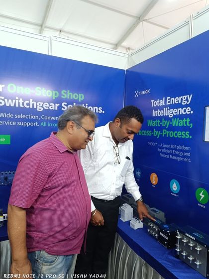 Demonstrating my smart IoT platform for energy and process management to an attendee at IMEX Hubli.