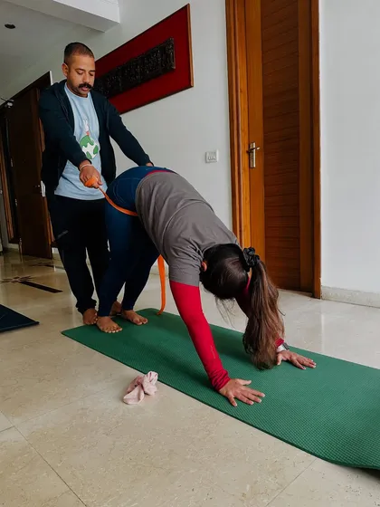 Personal attention is key, especially in a group setting. I am here to provide hands-on adjustments, like helping a student find more length in Adho Mukha Svanasana (Downward-Facing Dog), ensuring you get the most out of every posture.
