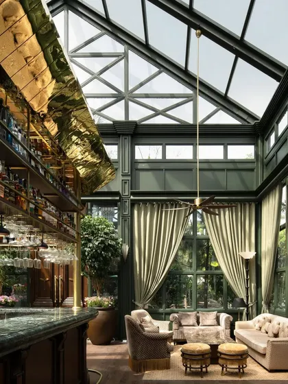 I designed this glasshouse bar to be a dialogue between structure and nature. The grand, light-filled volume, with its brass and marble bar, creates an opulent oasis. The experience is one of escapism, where the boundary between the lush exterior and the curated interior dissolves.