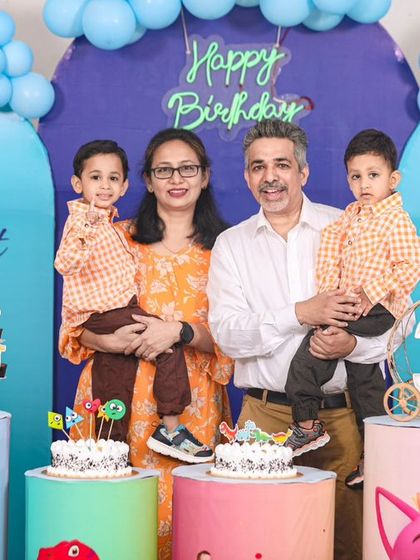 A thrilling 'Spiderman' themed birthday party, with red and blue decor, spiderweb props, and a cityscape backdrop, ready for web-slinging action.