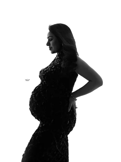 Creating a powerful silhouette is a key skill. I'll show you the lighting setup and posing direction needed to capture the beautiful shape of the baby bump in profile.