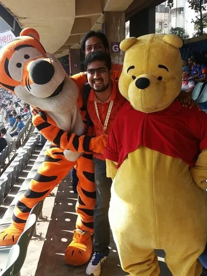 Winnie the Pooh and Tigger mascots entertaining the crowd at a large stadium event. My character appearances are suitable for both small birthday parties and large-scale carnivals.