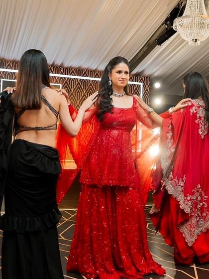 The bride and her squad in a powerful pose during their performance at a destination wedding in London.