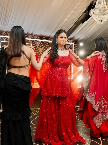 The bride and her squad in a powerful pose during their performance at a destination wedding in London.
