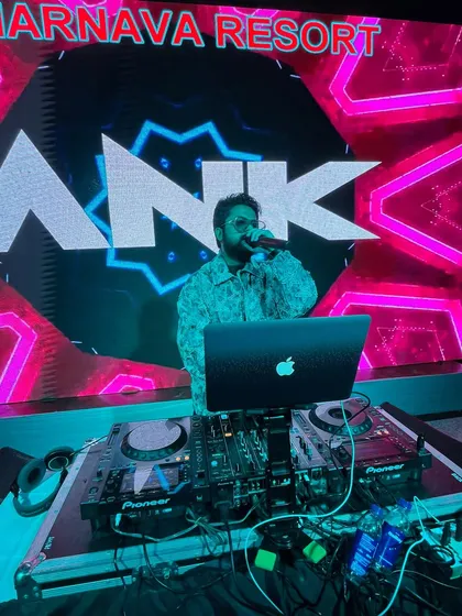 On the mic at the Dehradun NYE party. I make sure to engage with the crowd and act as an MC to keep the energy high.