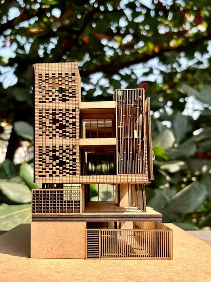 Physical models are a crucial part of my design process. This model for the 'Heal & Heaven' project helped us and the client visualize the interplay between the clinic on the lower levels and the residential duplex above, ensuring the form truly followed its dual function.