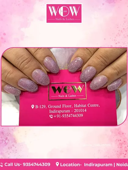 A perfect manicure results in flawless nails and soft hands. This look features a beautiful mauve glitter polish on perfectly shaped oval nails, showcasing a clean and polished finish.