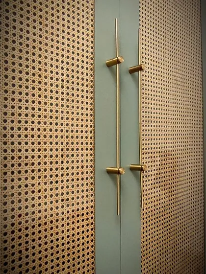 We believe even storage should be a statement piece. For this wardrobe, we combined natural cane webbing with a soft sage green finish and custom brass handles, creating a piece that’s both functional and a beautiful focal point.
