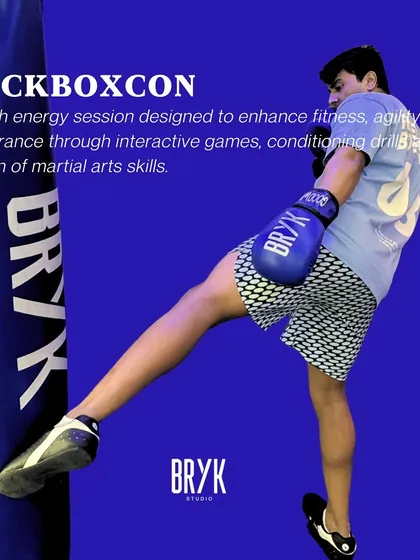 Meet KICKBOXCON, our signature high energy session. This class is a fusion of martial arts skills, conditioning drills, and interactive games designed to boost your fitness, agility, and endurance.