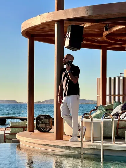 On a call by the pool in Greece. The work never stops, even in the most beautiful locations.