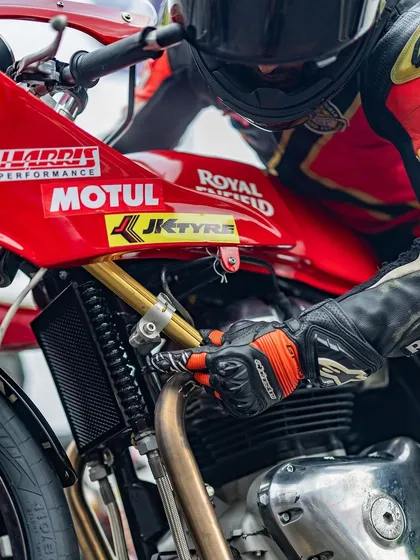 A close-up of the steering damper on a race-prepped GT 650. This component is crucial for controlling front-wheel movement and reducing wobbles at high speeds.