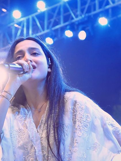 Lost in the music during a Garba night performance in Ahmedabad. The combination of bright lights and a passionate crowd creates a truly magical atmosphere.