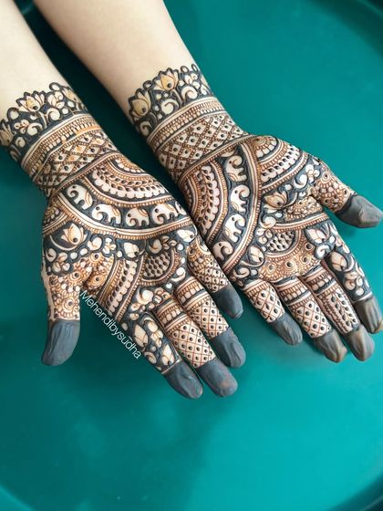 A full view of the elephant-themed short-hand design, showing its intricate and compact beauty.