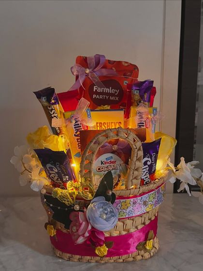 Another shot of the illuminated yellow gift basket, showcasing its cheerful and abundant nature. A perfect gift to brighten someone's day.
