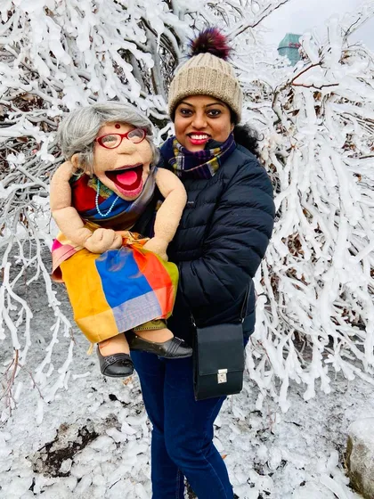 'Kannadada Ajji in Canada!' A throwback picture of Ajji enjoying the snow during one of our international trips. She brings her warmth everywhere she goes.