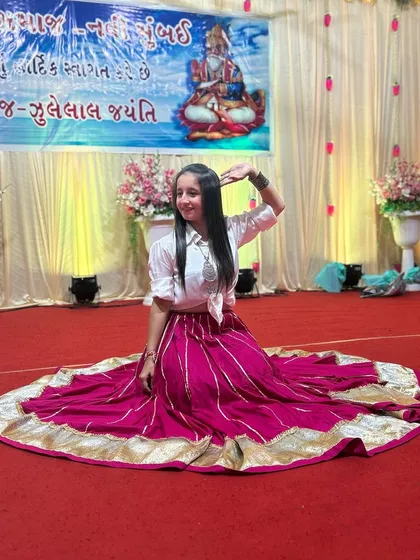 Showing the full flare of my skirt. I love outfits that allow for beautiful, dramatic movements when I dance.
