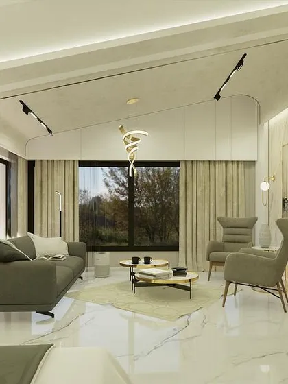 A view of the bedroom's lounge area, with a unique curved ceiling detail and modern track lighting.