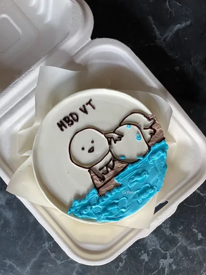 Another cute cartoon bento cake, perfect for celebrating a birthday with a touch of playful art.