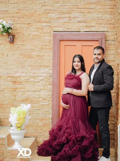 A classic portrait of a couple posing on a rustic staircase, creating a timeless and romantic image.