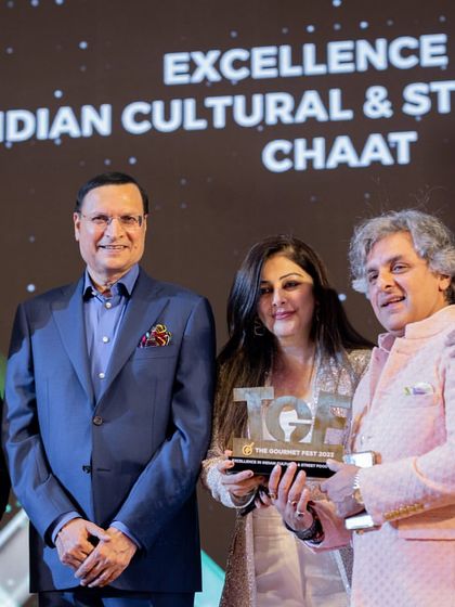 A closer shot of the team accepting the award for our Chaat catering. This recognition fuels our passion for bringing authentic and innovative street food to luxury events.