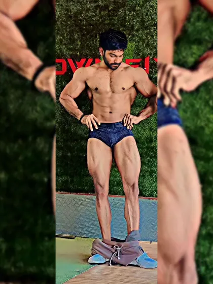 Leg development is critical for a balanced physique. This pose highlights the separation in the quadriceps and overall leg mass, a result of intense, high-volume leg day workouts.