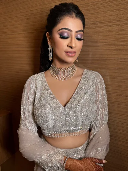 A close-up of this gorgeous purple smokey eye. The colors are blended to perfection, creating a look that is both glamorous and sophisticated.