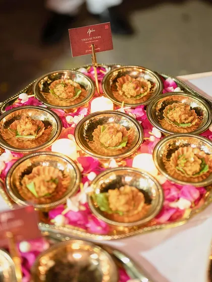A dish from our Ghazal Night catering menu, Tikka Ke Tohfe. These Chicken Tikka Salad Canapés are served in delicate, edible cups, offering a modern twist on a classic flavour.