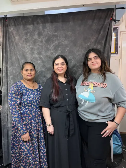 Posing with attendees after a successful seminar. I love connecting with passionate artists and sharing my knowledge.