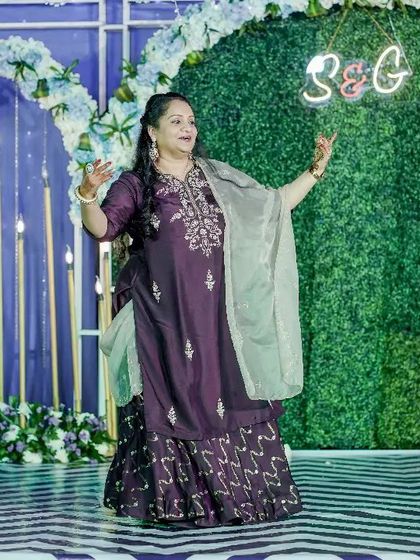 A mother or aunt enjoying her solo moment on stage. My choreography is for all ages and skill levels.