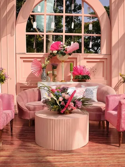 A close-up of the plush pink lounge seating at the 'Whispers of the Orient' event.