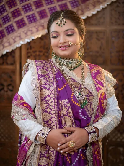 This look, inspired by 'Radhe ne Shyaam Mali Jase', captures the divine essence of a Gujarati bride.