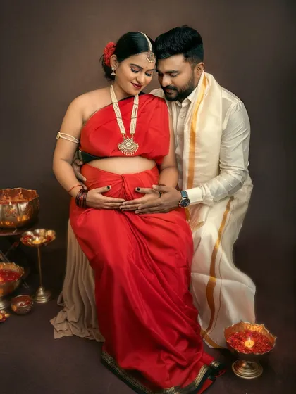 An intimate moment within a traditional setting, this portrait captures the couple's deep connection and shared cultural values.