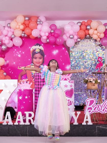 A playful 'Masha and the Bear' themed birthday party, with forest decor, character cutouts, and colorful balloons, perfect for a fun-filled adventure.