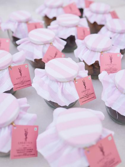 Our dessert jars, wrapped in elegant pink and white striped cloth. These make for perfect party favours or additions to a larger hamper.