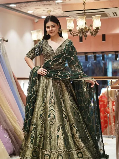 Embrace the festive spirit with this brocade green lehenga, crafted for those who love to dazzle.