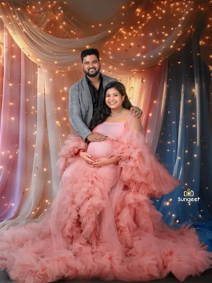 A beautiful couple's portrait against our sparkling fairy light curtain. The soft lighting creates a romantic and magical ambiance.