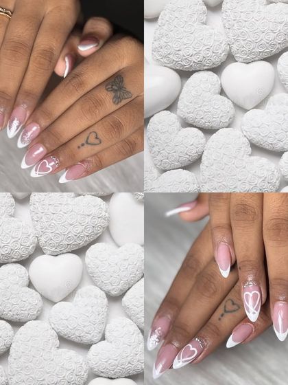 A sweet and romantic take on the French manicure. I used a clean white line to create heart shapes at the tips, perfect for celebrating love.