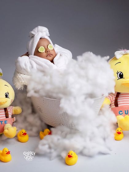 Just chilling. This baby is in full relaxation mode during a spa-themed bath time shoot.