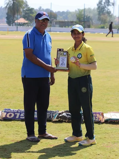 A player receives her "Woman of the Match" trophy during a competitive tour, recognizing her outstanding contribution.