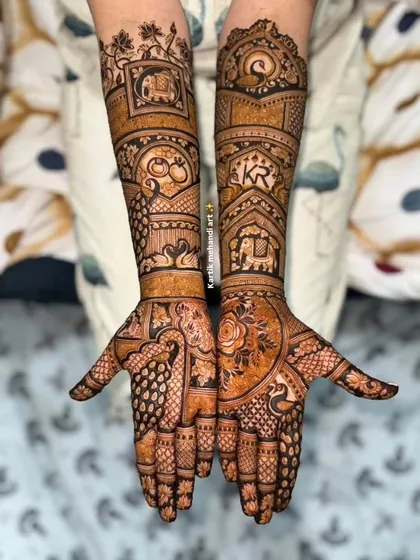 This is what we do best: creating flawless, intricate bridal mehandi that tells a story. Notice the fine details, from the wedding doli procession to the couple's initials, all drawn with a steady hand and our 100% natural henna paste.