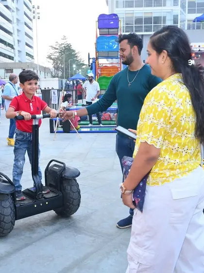 Cruising in style on a hoverboard. I can arrange for fun and modern rideables like these to be available for guests to try out in a designated safe area.