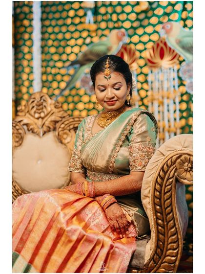 A portrait of a bride on her engagement day, looking elegant and serene in her traditional attire.