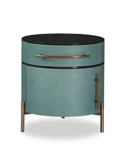The PLUSE leather night table. The structure is curved plywood with a matte black-stained oak veneer, while the shutter and drawer front are covered in a beautiful sage-green leather, all resting on a hand-finished burnished metal base.