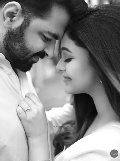 This intimate forehead-to-forehead pose is a classic for a reason. In black and white, it becomes a powerful symbol of closeness and connection.