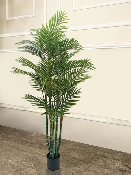 This tall artificial areca palm brings a light and airy tropical feel to any room. Its feathery fronds create a sense of height and movement, making it a great choice for an entryway or living room.