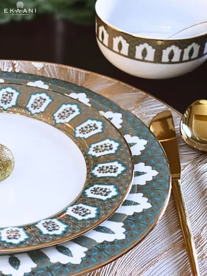 The Ichkan Collection redefines fine dining. This close-up reveals the delicate gold detailing on fine porcelain, a symphony of Mughal art and modern design that turns every meal into an artistic celebration of heritage and taste.