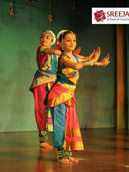 Two of our younger students performing a duet. It is wonderful to see their confidence and coordination grow with each performance.