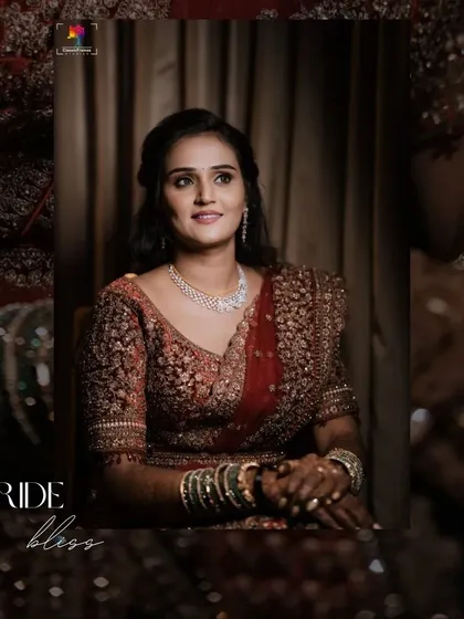 "Bride bless." A warm and intimate portrait of a bride in her reception lehenga. The soft lighting creates a gentle and blessed atmosphere.