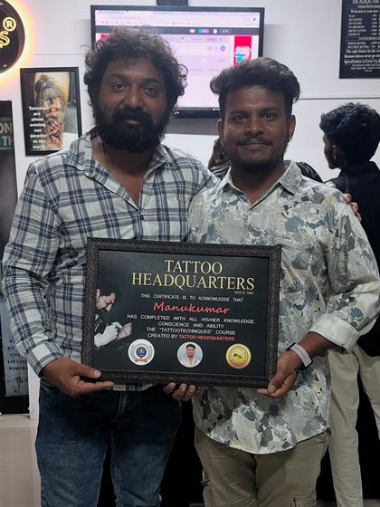 Manukumar from the May batch, celebrating the successful completion of his tattoo techniques course at Tattoo Headquarters.
